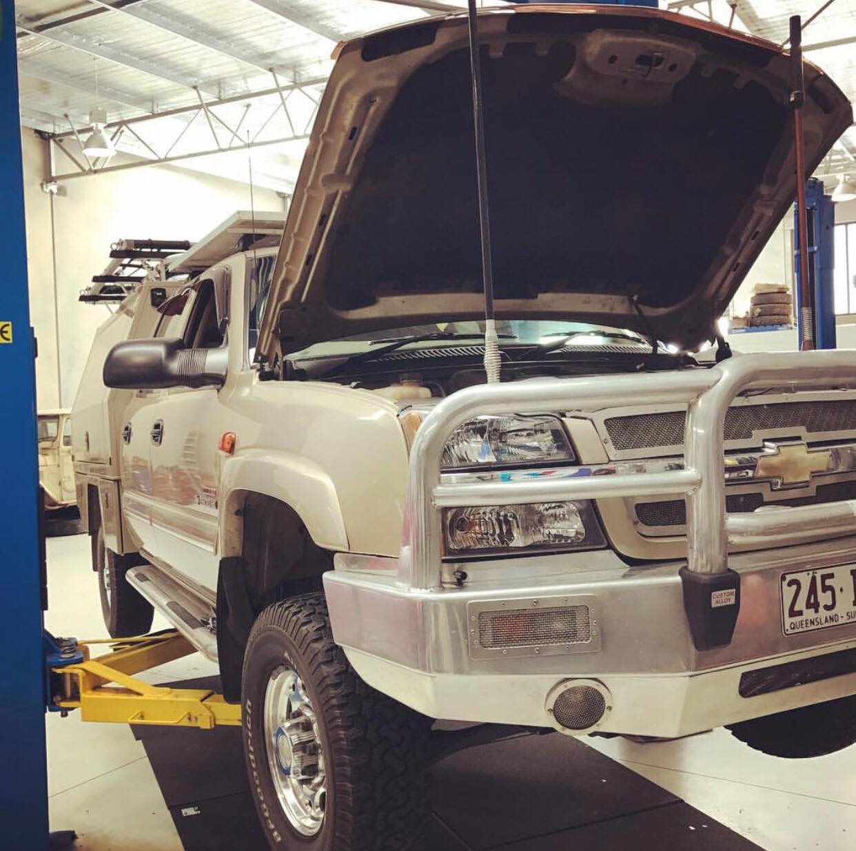 An automotive getting serviced by mechanics in Geelong.